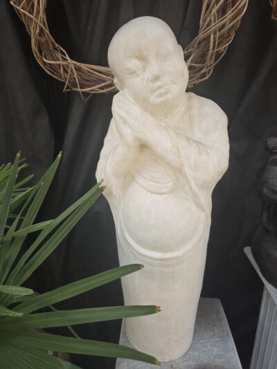 # 18 Standing Baby Buddha. White.