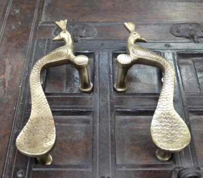 Brass Peacock Handles.