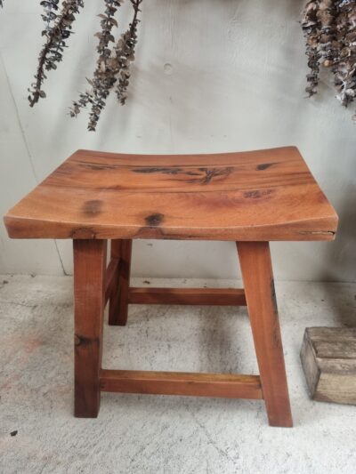 Wooden stool-curved top-brown.