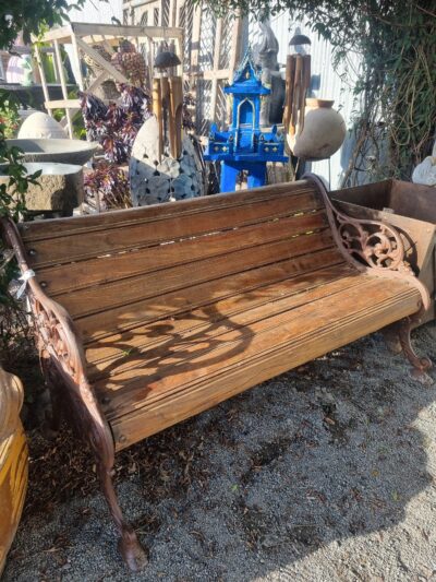 Wrought Iron and wood bench seat.