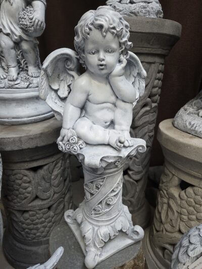 Cupid on a pedestal.