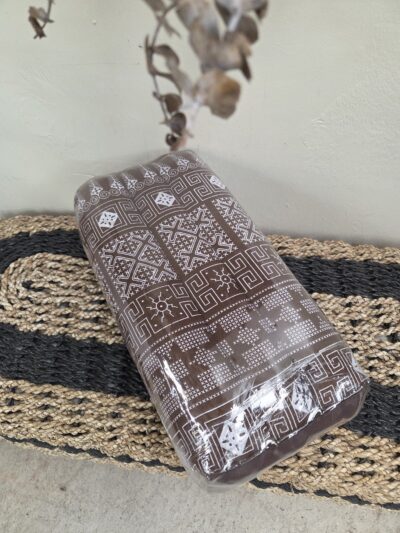 Oblong cushion. Brown