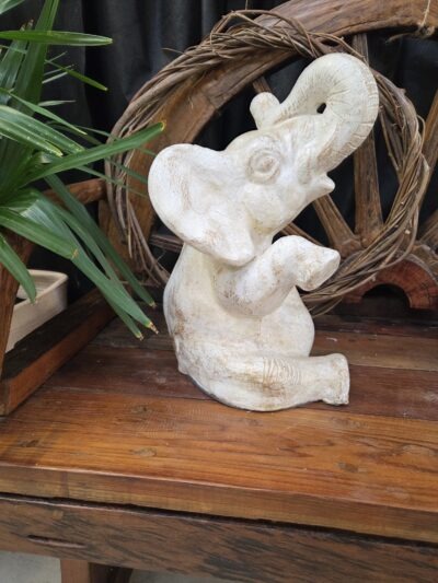 Ceramic elephant-small sitting.