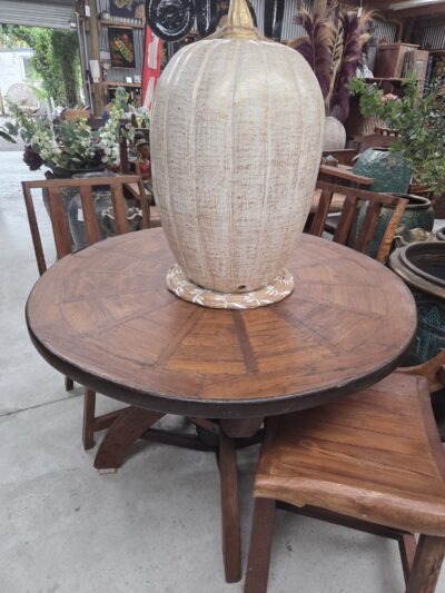 Solid Wagon wheel dining table.